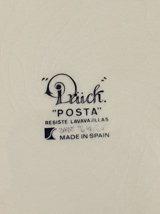 Plato antiguo de porcelana con escena