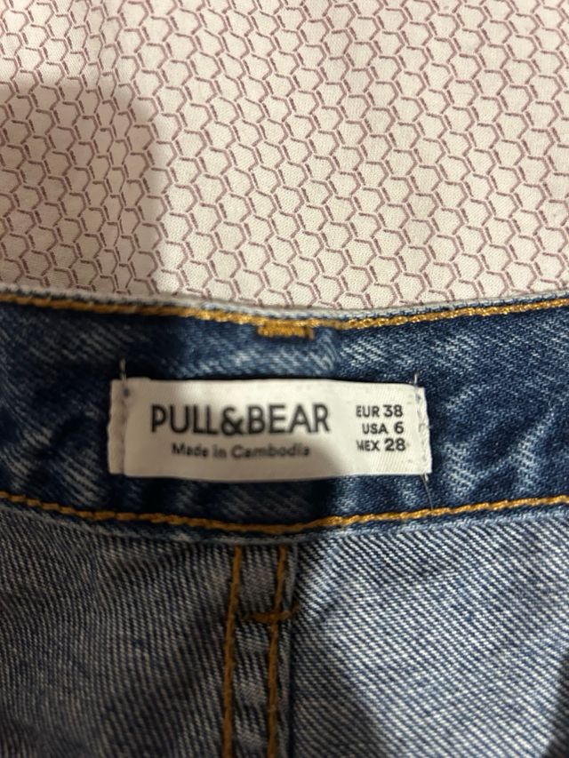 Shorts jeans strappati