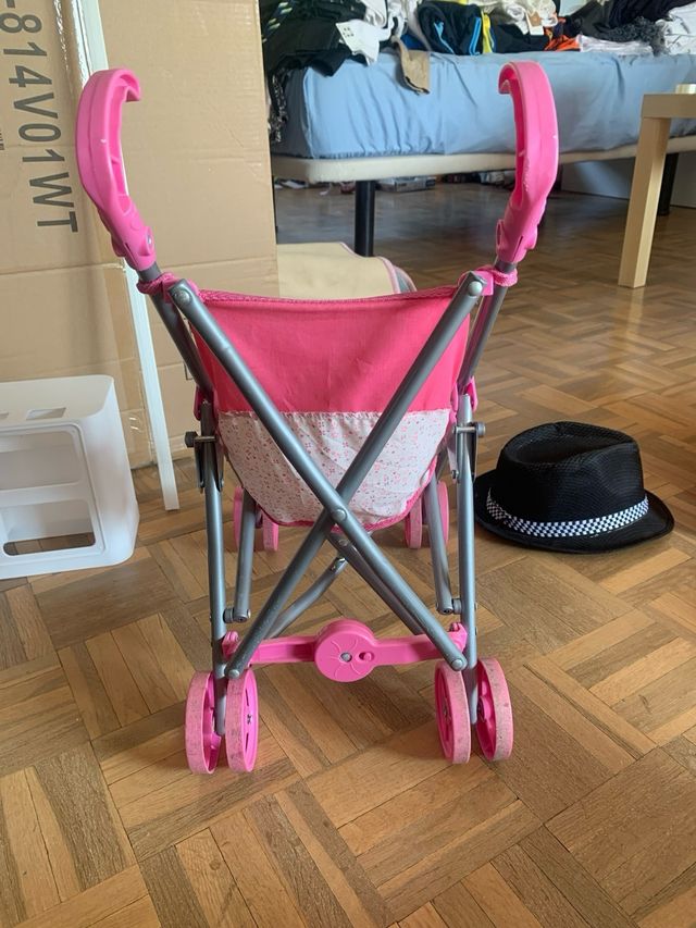 Cochecito muñecas niña rosa