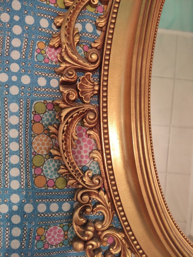 Espejo vintage dorado ovalado 77×112