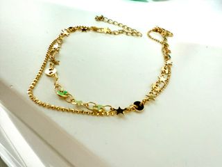 Tobillera dorada estrellas doble 