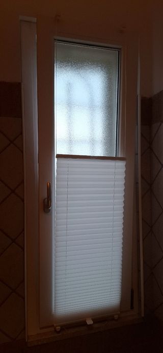 Tende plissettate bianche nuove