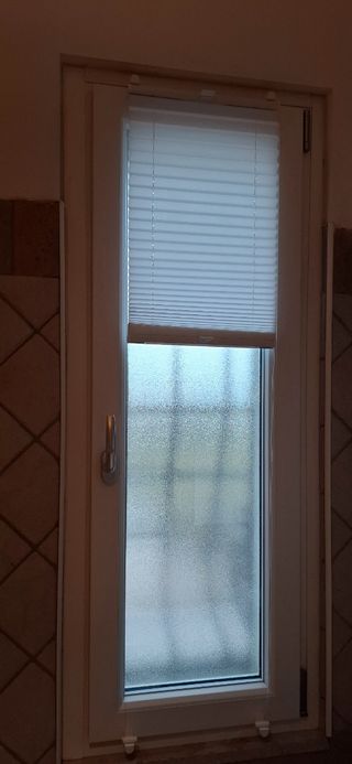 Tende plissettate bianche nuove