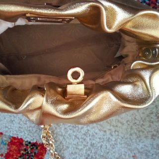 Bolso dorado | Fiesta
