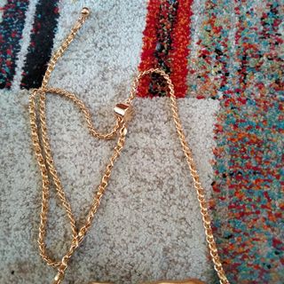 Bolso dorado | Fiesta