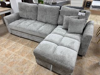 Sofá Esquinero Gris con Asientos Deslizantes. 