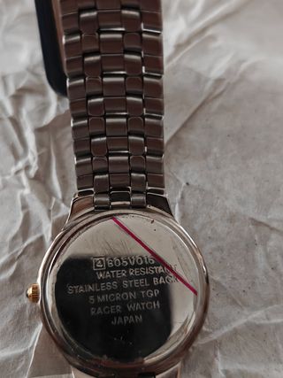Reloj Racer dorado y plateado
