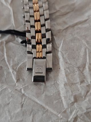 Reloj Racer dorado y plateado