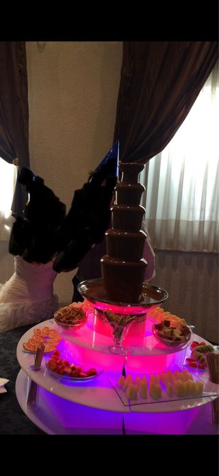 Fuente chocolote con expositor de luces