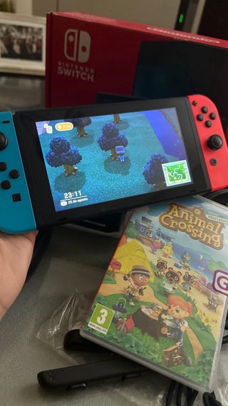 Nintendo Switch roja + Animal Crossing + protector