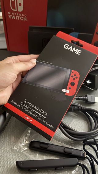 Nintendo Switch roja + Animal Crossing + protector