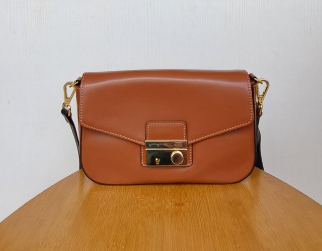 Bolso innue marrón