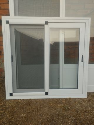 Ventanas perimetral RPT, climalit y mosquitera.