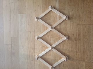 Percha madera plegable