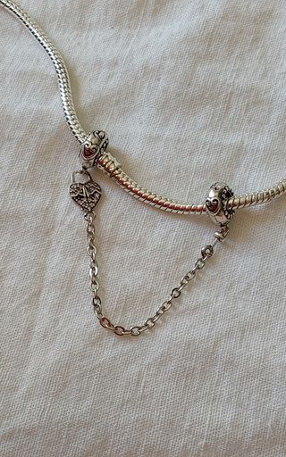 Cadena de seguridad  plata 925 - 2 encantos