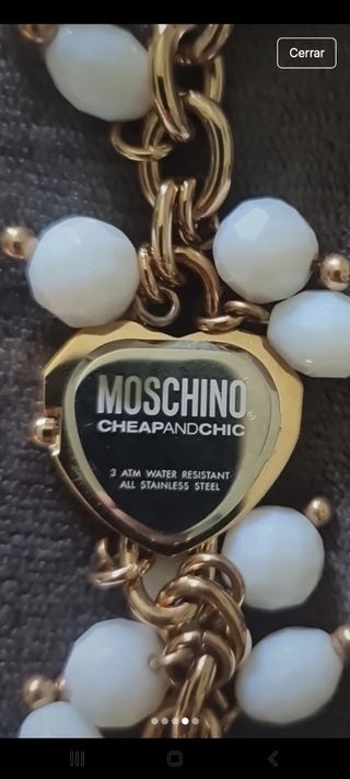 Reloj Moschino dorado y blanco