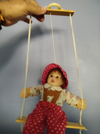 Muñeco columpio vintage