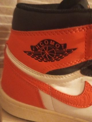 Jordan1 - collaborazione ihcomot nere e arancion
