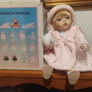 Muñeca musical porcelana