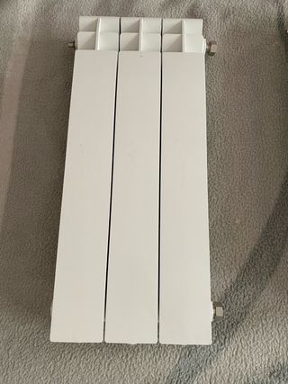 Radiador agua 3 elementosblanco y 1 de 4 elementos