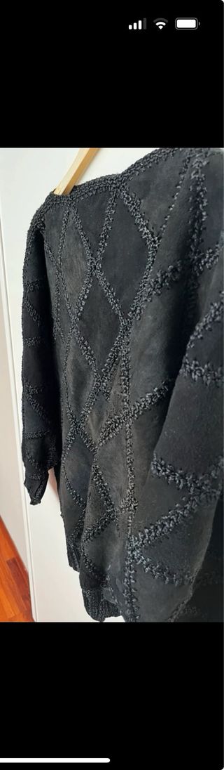 Maglia in pelle nera vintage