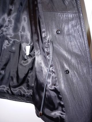 Chaqueta negra piel y chaleco de pelo