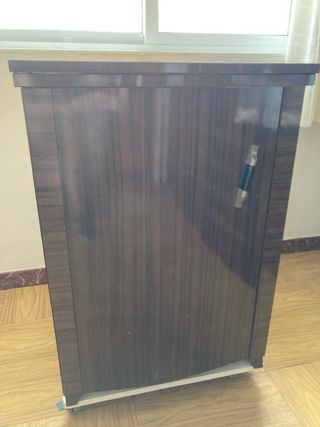 Máquina de coser Singer antigua 1915 con mueble