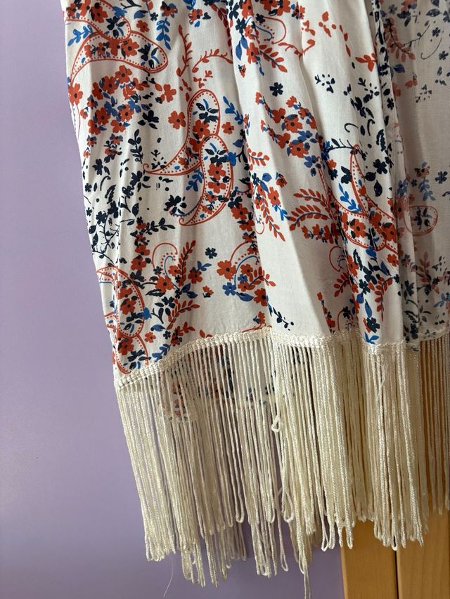 Chaleco blanco flecos