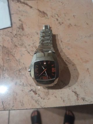 Reloj Naranja y Plata