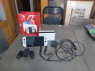 Nintendo Switch OLED bianco+ vari giochi