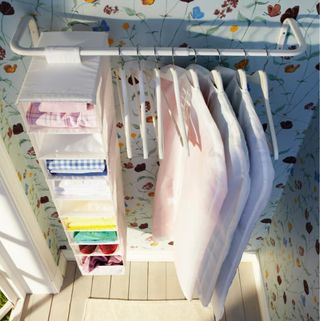 Barra Ikea extensible blanca. 60 - 90 cm