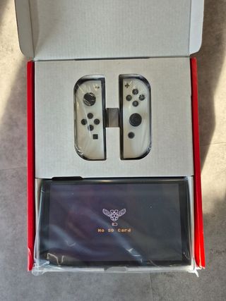 Nintendo Switch OLED blanca precintada,128gb,funda