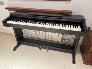 Yamaha Clavinova CLP-153 S de segunda mano por 400 EUR en