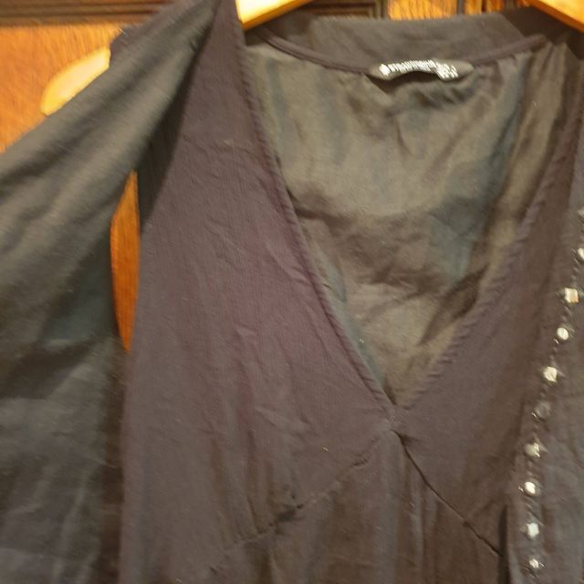 Vestido negro Stradivarius con chaleco