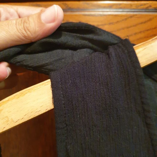 Vestido negro Stradivarius con chaleco