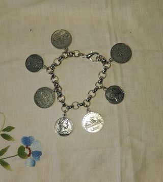 Braccialetto vintage monete acciaio