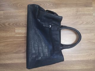 Cuatro bolsos de mano sin uso