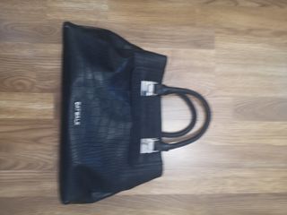 Cuatro bolsos de mano sin uso