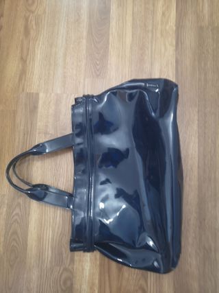 Cuatro bolsos de mano sin uso