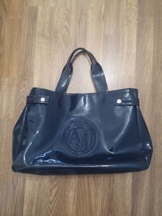 Cuatro bolsos de mano sin uso