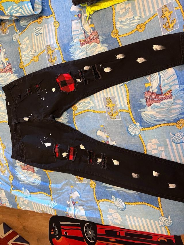 Jeans neri rossi bianchi stapparti