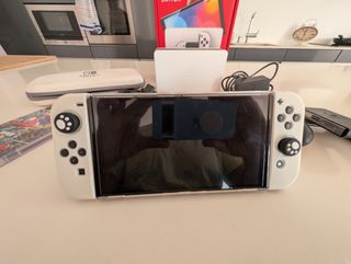 Nintendo Switch OLED Blanca + juego Mario odyssey 