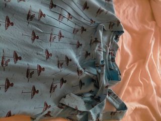 Blusa turquesa sombrillas
