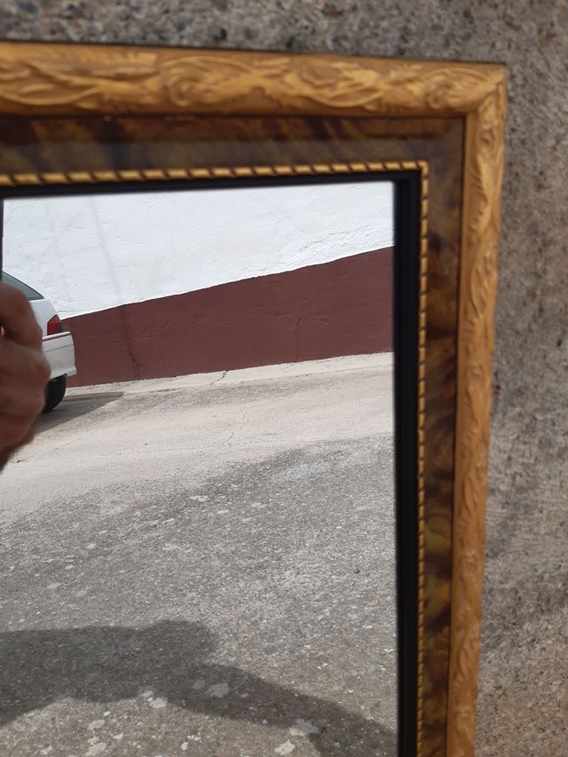 Espejo antiguo dorado y marrón