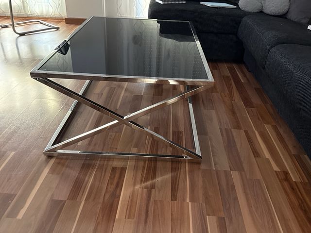 Mesa centro  cristal negra y patas metalicas