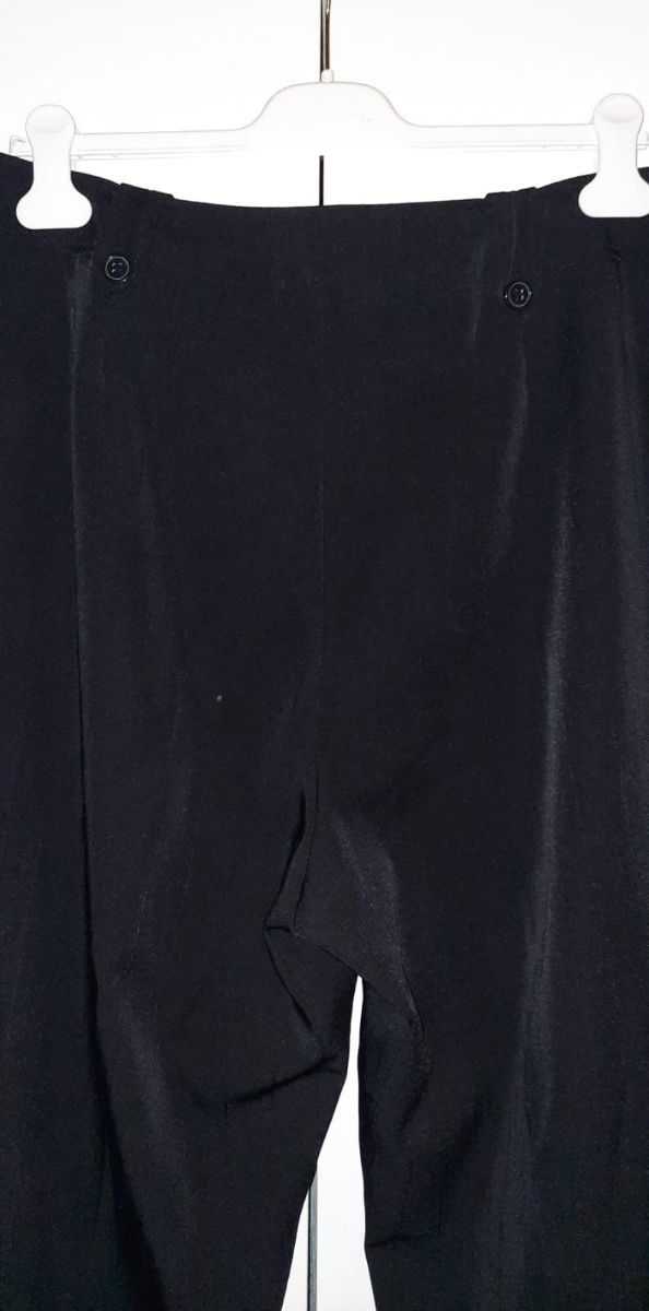 Calças pretas tamanho grande