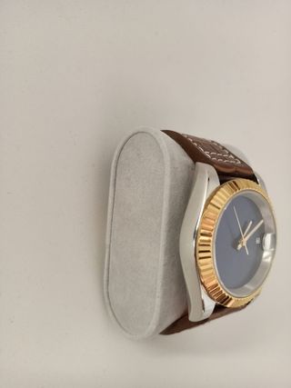 Reloj automático azul y dorado
