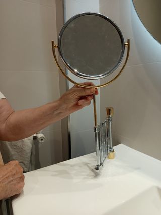 Espejo doble aumento dorado