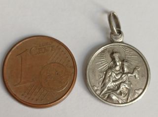 Medalla antigua religiosa de plata