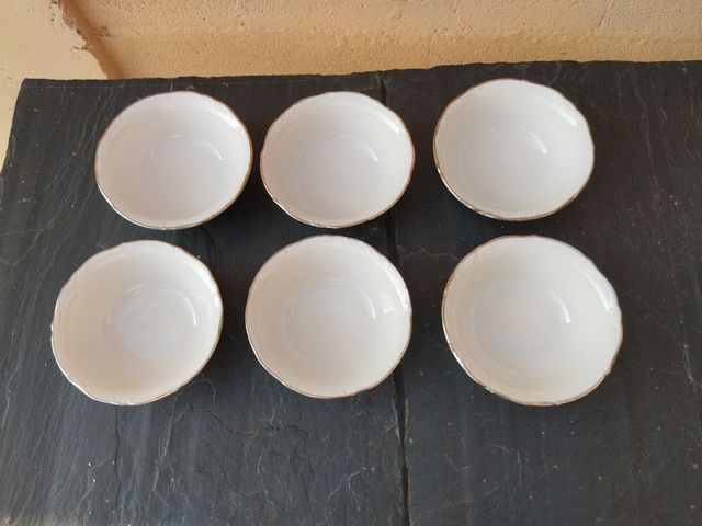 6 Cuencos porcelana Winterling borde plateado.